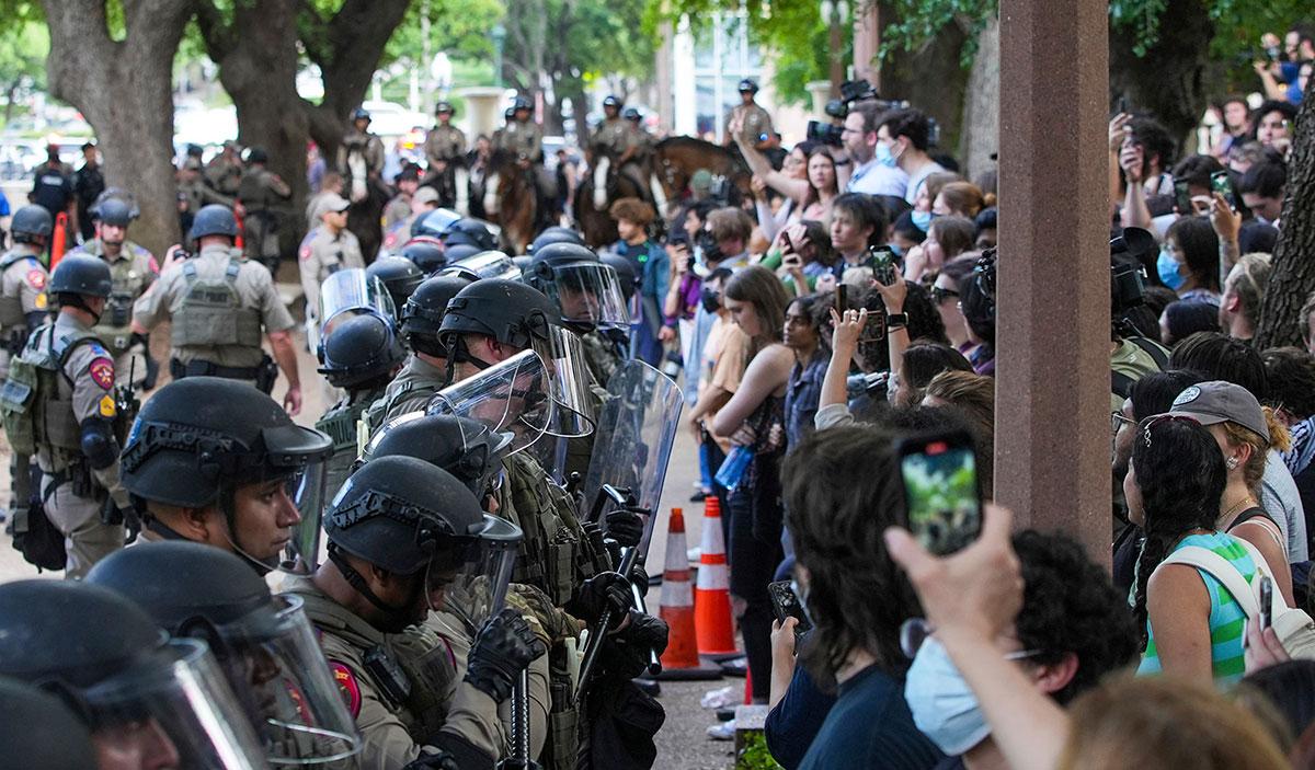 Pro-Palestinian protesters at the University of Texas, Austin are confronted by police, April 24, 2024.
