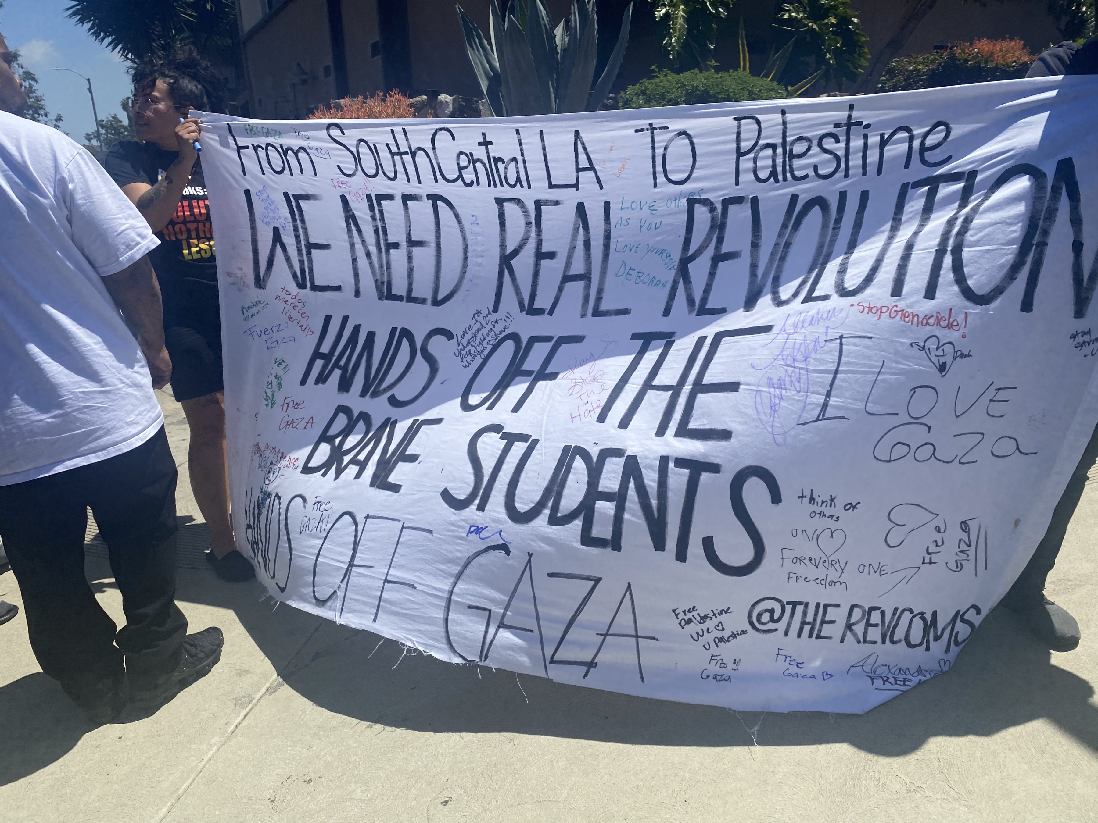 Taking Banner Supporting Protestors and Gaza to South Central Los Angeles