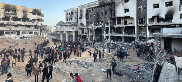 People search for bodies in the rubble at Al-Shifa Hospital, April 1, 2024.